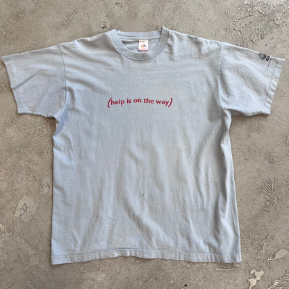(Help is on the way)... Tee